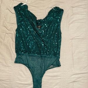 Green Sequin bodysuit. Never worn. Fits as sized. M